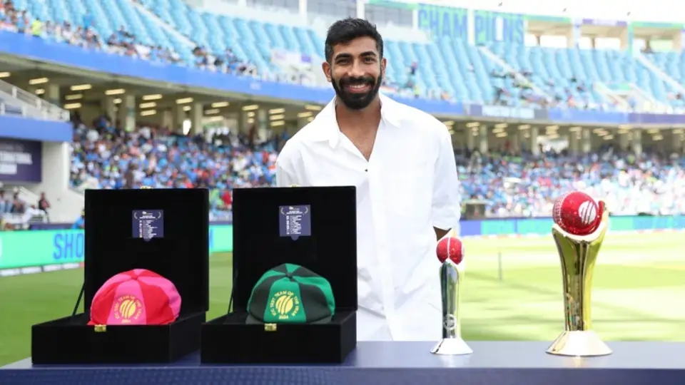 Jasprit Bumrah poses with his ICC Awards for 2025
